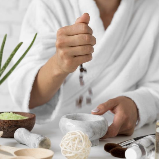 close-up-woman-preparing-remedy
